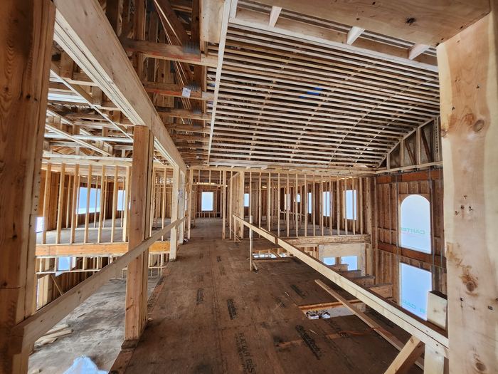 Second-floor framing and roof structure during construction