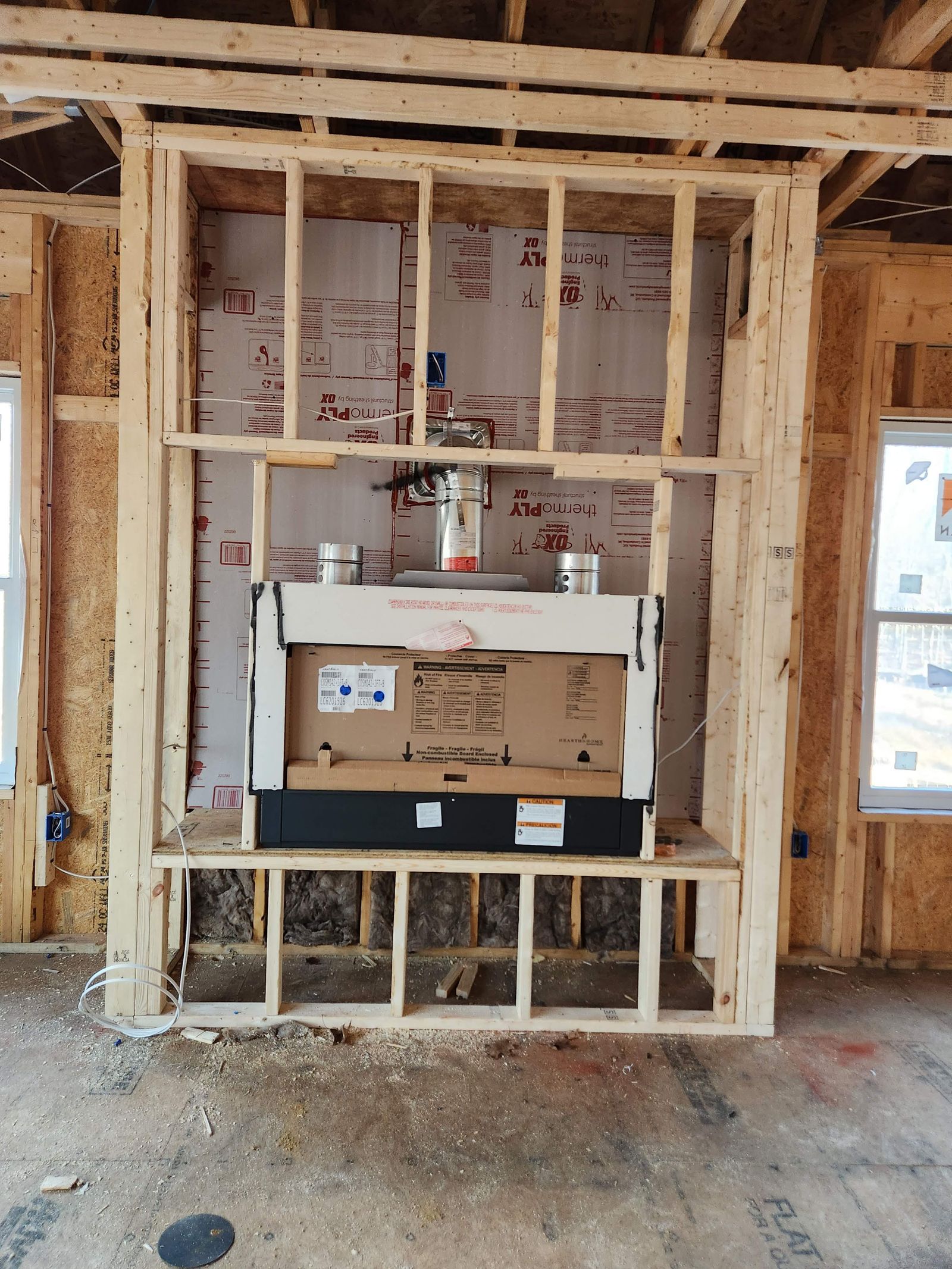 Framed walls with mechanical and electrical rough-in ready for inspection
