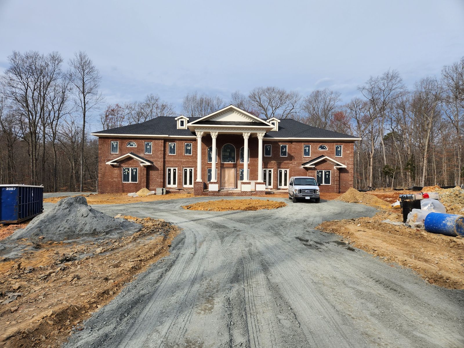 Completed brick elevation of a custom estate residence built by Agile1Tech
